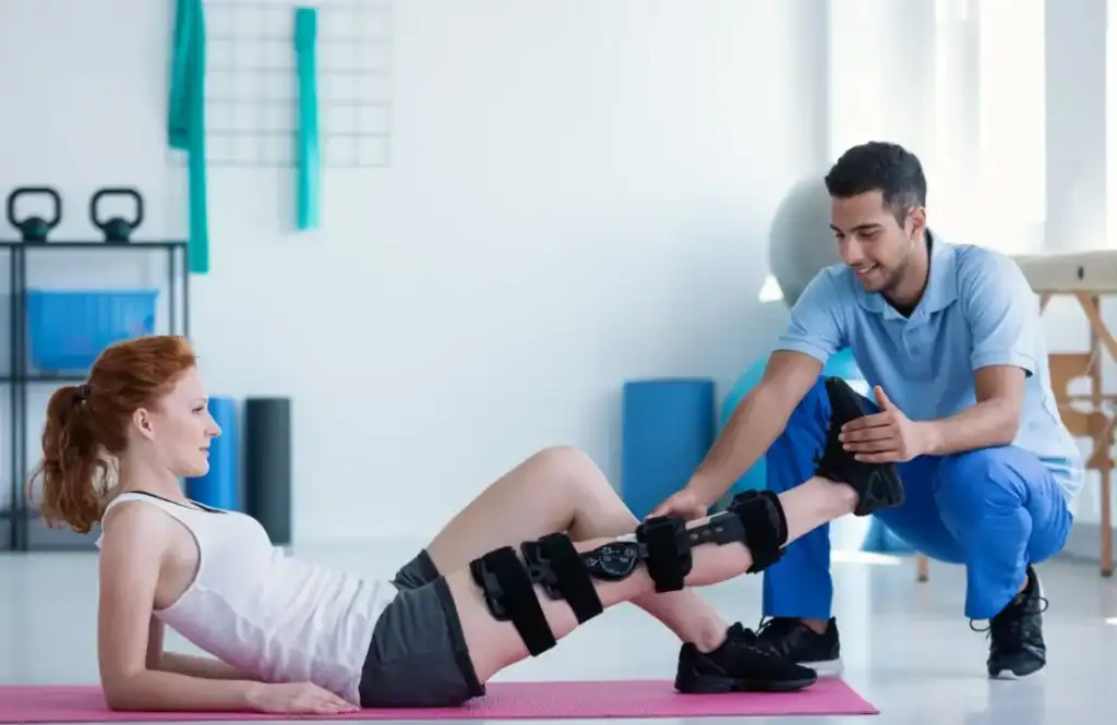 Woman having treatment to help muscle recovery Woking after an injury