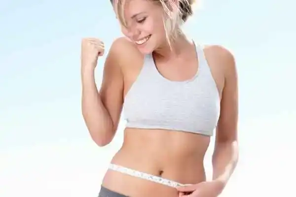 Unraveling the Mystery: Where Does the Body Fat Loss From First? 3 Image of woman happy with fat loss Woking