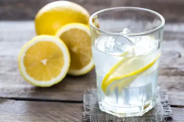Hydration: The Secret Ingredient for a Toned Stomach and Enhanced Fitness 2 Image of lemon water to aid hydration Woking
