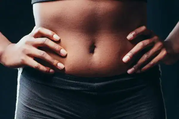 Toning Your Stomach: The Ultimate Guide to Achieving a Sculpted Stomach While Shedding Pounds 1 Image of a toned stomach after non surgical treatment Woking